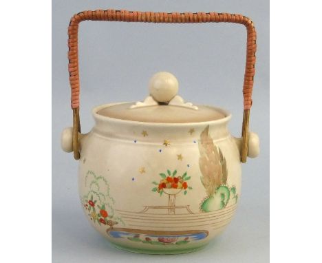 A Clarice Cliff Wilkinson Limited biscuit barrel and cover, shape No. 335, painted and enamelled with trees, bowls of flowers