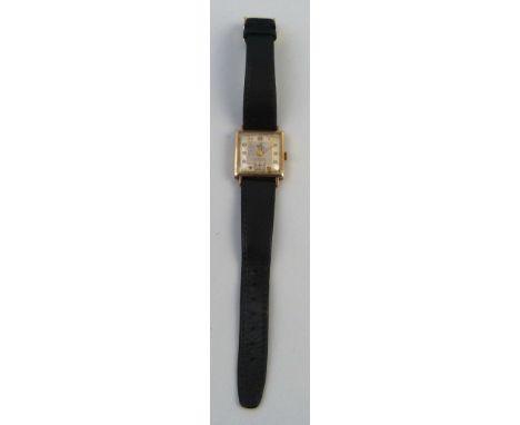 A gentleman's Trebex wristwatch, the manual wind movement with silvered square dial, Arabic numerals and subsidiary seconds d