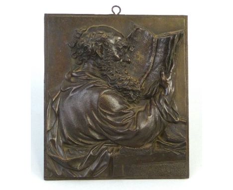A 19th century continental iron plaque, of oblong form cast in high relief with a half length portrait of an ancient bearded 