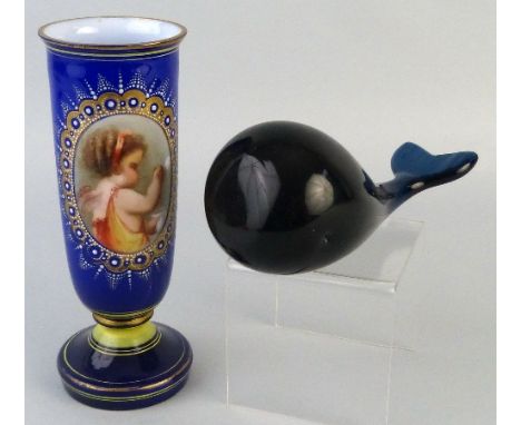 A continental opaque and blue glass vase, of slightly tapering pedestal form painted with a portrait of a putto blowing bubbl
