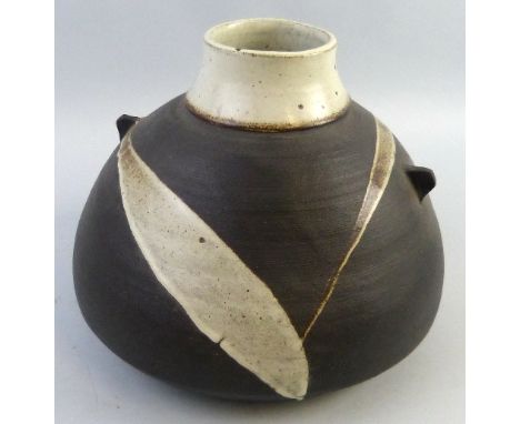 Janet Leach, a Leach Pottery stoneware vase of flattened circular form with twin lug handles with trailing glaze on an unglaz