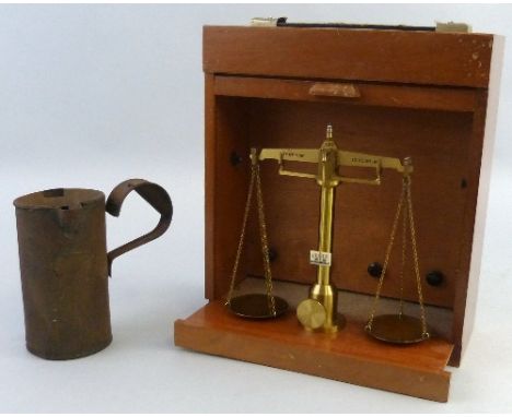 A set of travelling brass balance scales, by Reverifications Ltd to weigh 1oz, inscribed City of York, in mahogany tambour fr