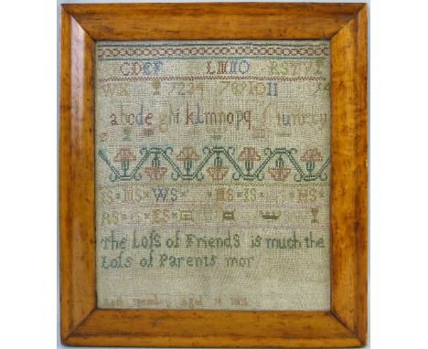 An early 19th century needlework sampler, depicting alphabet, numbers and an inscription, worked by Ruth Spencley aged 14, da