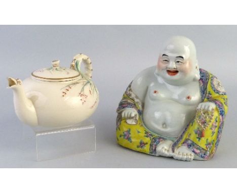 A Belleek grass tea-pot, with first version black mark, 20cm wide and a 20th century Chinese figure of a seated Buddha, 19cm 