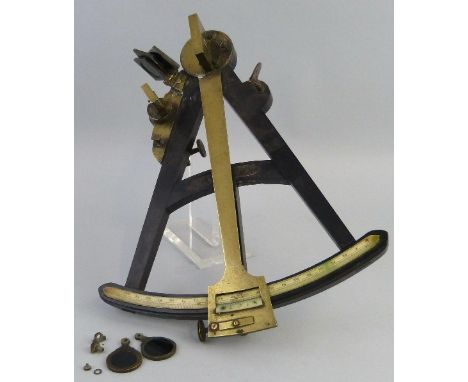 A 19th century ebony and brass vernier octant, the A-shaped frame inset with an ivory scale and mounted with a brass framed m