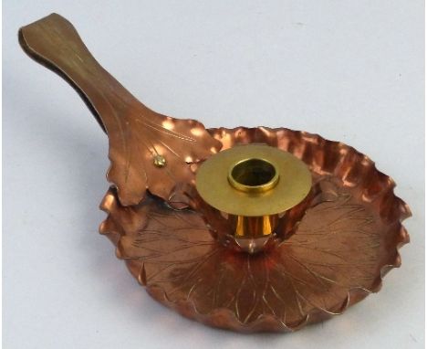 A Benham and Froud copper and brass chamber stick, after a design by Christopher Dresser of circular form with crimped rim, f