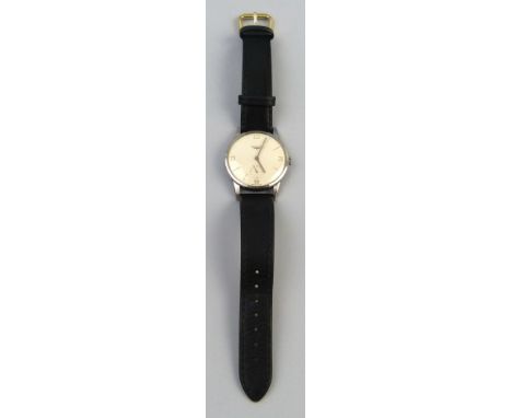 A gentleman's Longines wristwatch, the manual wind movement with cream circular dial having quarter hour numbers and batons, 