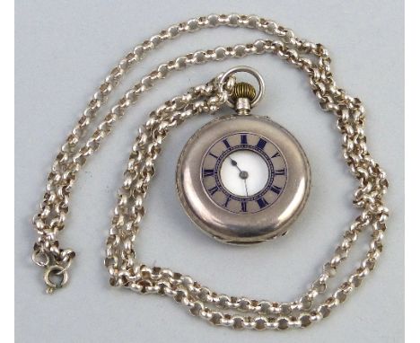 A late Victorian half hunting cased fob watch, having enamelled dial with Roman numerals in silver case with blue enamelled c
