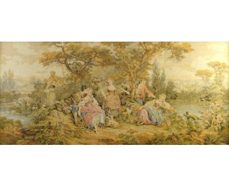 A machine made tapestry panel, depicting a landscape scene with figures by a lake with trees and a town beyond, 71cm x 160cm,