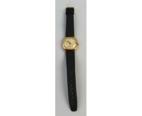 A gentleman's Tudor wristwatch, the manual wind movement with cream circular dial having even hour numbers alternating with b