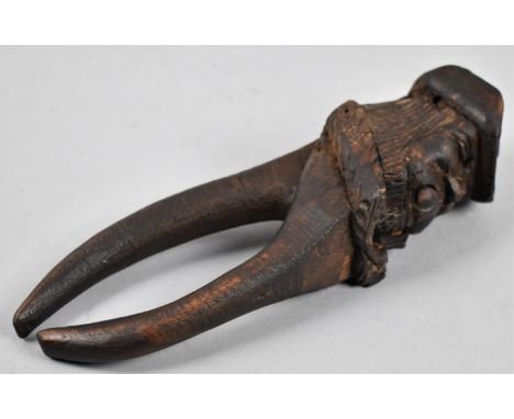 A Mid 20th Century Carved Wooden Black Forest Nutcracker in the Form of a Bearded Gent, 20cm high 