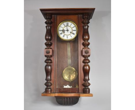 An Edwardian Mahogany Vienna Style Wall Clock, 80cm high 