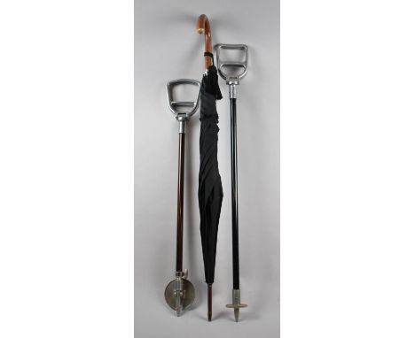 Two Vintage Shooting Sticks and an Umbrella 