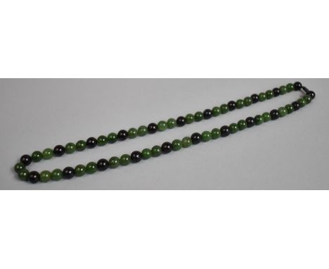 A String of Jade Beads, Approx 50cm Long with White Metal Clasp 