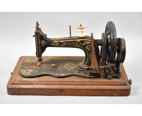 An Early Manual Singer Sewing Machine 