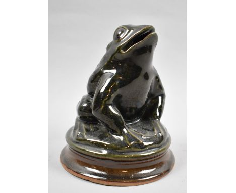 A Modern Glazed Ceramic Novelty Money Box in the Form of a Seated Frog, 15cm high 
