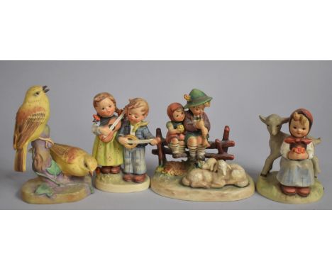 A Collection of Three Goebels Children Ornaments Together with a Royal Worcester Yellow Hammer Bird Ornament 