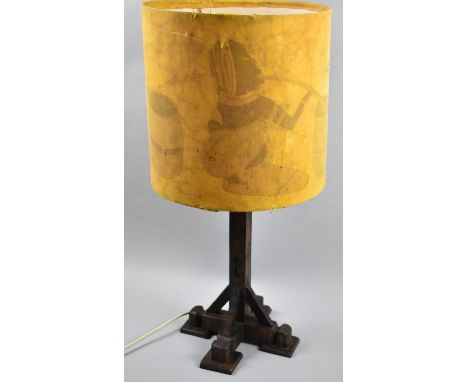 A Mid 20th Century Oak Table Lamp and Shade Decorated with African Tribal Scenes, 60cm High Overall 