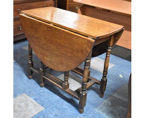 A Mid 20th Century Oak Drop Leaf Gate Legged Oval Topped Table, 91cm Wide 