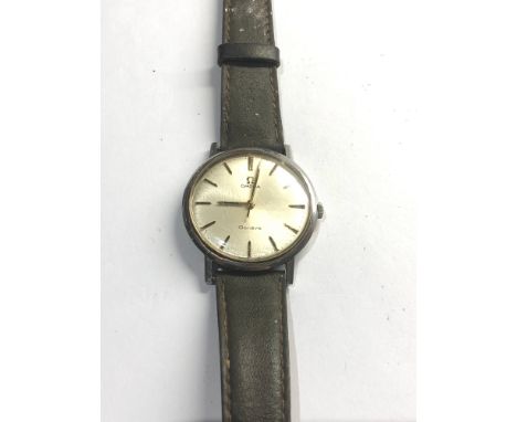 Omega Geneve stainless steel gents wristwatch case measures approx 34mm dia manual wind working order but no warranty given 