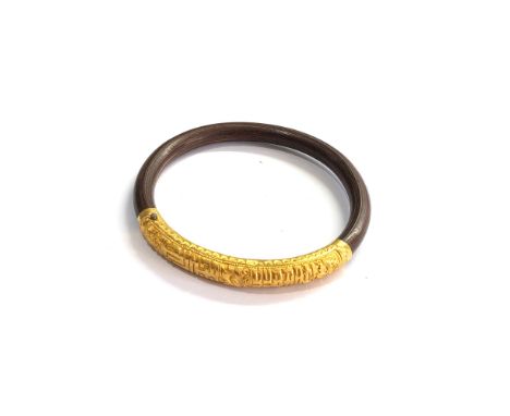 Asian wood and 22ct gold bangle 
