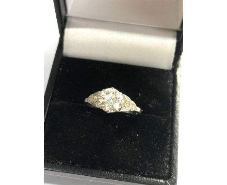 Fine antique platinum 0ld cut diamond ring central diamond measures 6.6mm dia est 1.10 ct with diamond shoulders weight 3g 