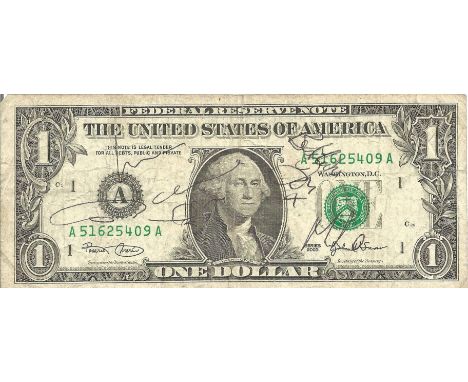 Boy George and Two Other Members of Culture Club signed One Dollar Bill. A Unique collector's item, well sought after. Good c