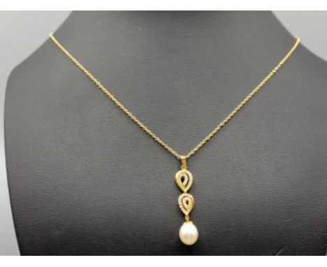 18ct Yellow Gold Diamond (0.62 ct total) and Pearl Fancy Pendant and Chain 45cm in length weighing 4.40 grams