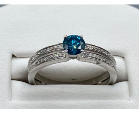 18ct White Gold Double Banded Ring with a 0.41ct coloured diamond centre stone surrounded by a total of 0.20ct of diamonds si