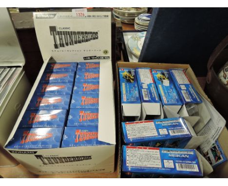 A selection of Konami Classic Thunderbirds model vehicle sets ex Shop stockCONDITION REPORT - 12 UNOPENED PACKS 6 OPENDED PAC