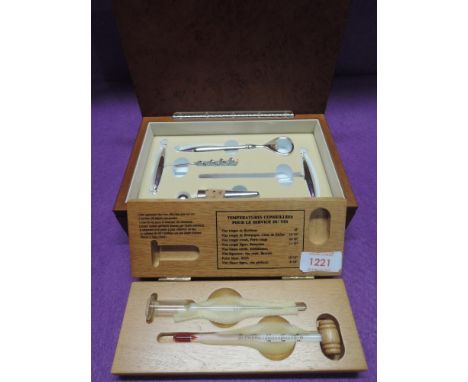 A selection of wine and spirit utensils including thermometer and opener set