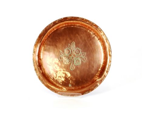 Hugh Wallace, Art Deco spot hammered copper tray, with floral decoration, impressed mark HW, 23cm dia.