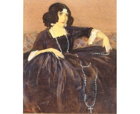 An Art Deco over-painted print of a reclining lady, in black lace dress with long pearl necklace