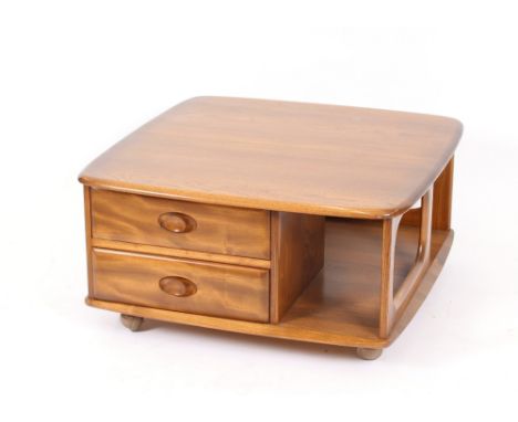 An Ercol coffee table, fitted two drawers and under tier, 76cm wide