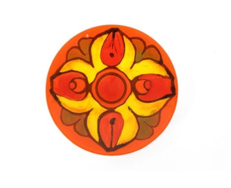 A Poole pottery orange and yellow fruit decorated shallow dish, 27cm dia. 