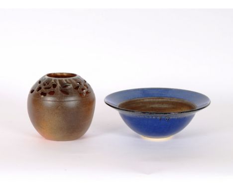 A circular blue glazed French Art pottery bowl, stamped DA, 31.5cm dia.; and a brown glazed French pottery vase with pierced 