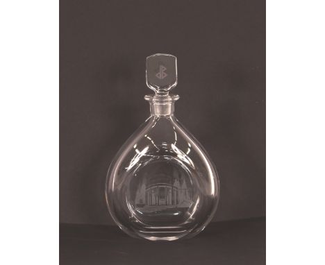 An Orrefors glass decanter, having etched decoration of a &nbsp;building with initialed stopper, 26.5cm high