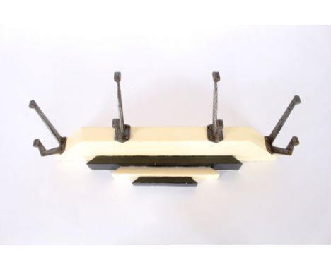 An Art Deco wooden and metal wall mounting coat rack, 52cm