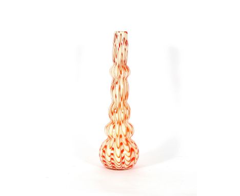 A decorative Italian glass baluster table lamp, decorated with orange streaks, 58cm high