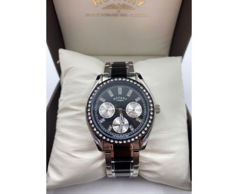 A Rotary Chronograph Quartz Ladies Watch. Two-Tone steel strap. Black dial. As new, in box, but needs a battery. 
