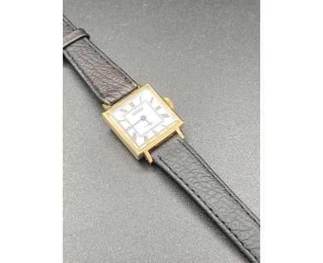 Vintage ladies Sekonda wristwatch, having square white face with black numerals in gold tone case. Original USSR production, 
