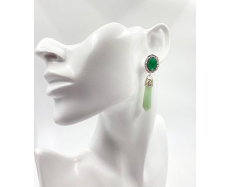 A Pair of Jade Stud and Drop Earrings. Two shades of Jade with White Stone decoration. 4cm drop. 