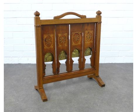 An Arts &amp; Crafts inlaid firescreen, with embossed brass panels of blossom and fruit,  56 x 64cm. 