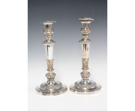 A pair of silver plate on copper candlesticks with detachable sconces, 27cm (2) 
