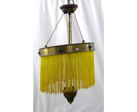 Brass rise and fall light fittings with fringed shade, 48cm diameter