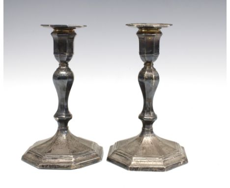 A pair of Victorian silver candlesticks, Sheffield 1892, knop stemmed with detachable sconce and standing on octagonal weight