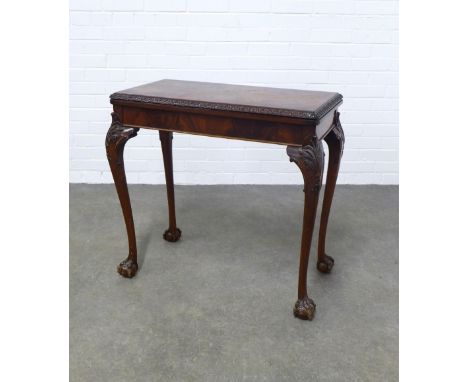 Mahogany foldover card table, on acanthus carved cabriole legs ending on claw and ball feet, 79 x 74 x 40cm.