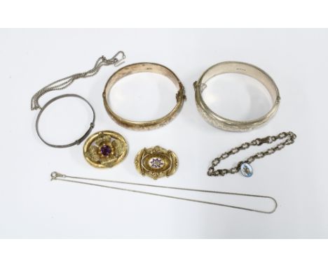 Three silver bangles, two Victorian yellow metal brooches, white metal chains and bracelet, etc (a lot) 