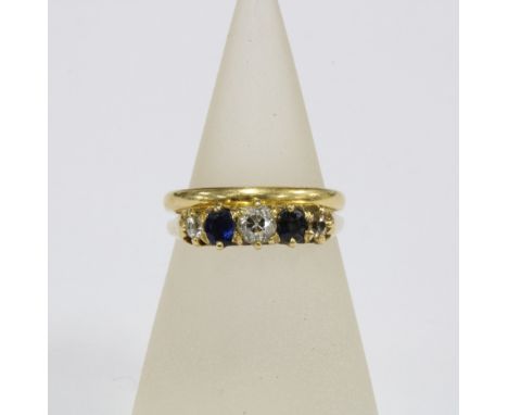 18ct gold wedding band and a diamond and sapphire ring, set in unmarked yellow metal (2) 