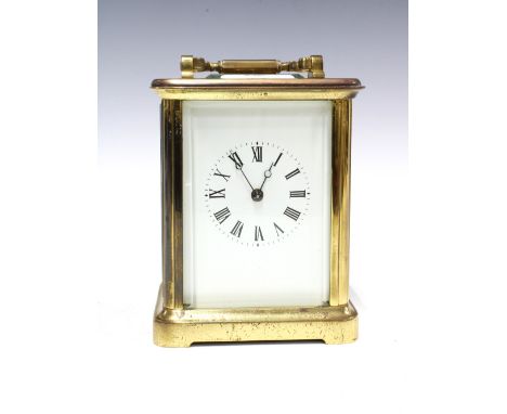 Brass and glass cased carriage clock of large proportions, 18cm high including handle 